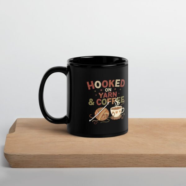 “hooked on yarn and coffee” mug – funny crochet quote cup for yarn lovers black glossy mug